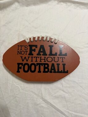 Brown Football-Shaped Sign "It's Not Fall Without Football"